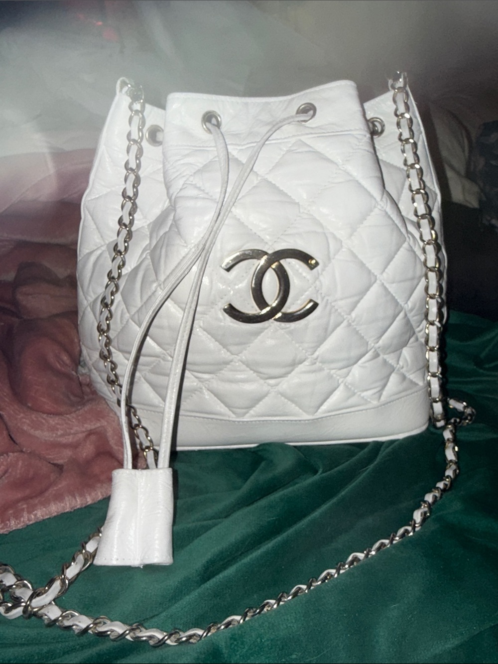 CHANEL Quilted Drawstring Bucket Bag in white with Gold-Tone CC